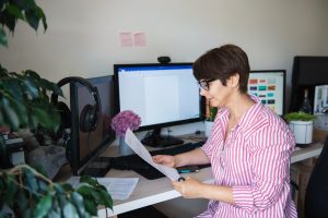 woman reviewing her letter of intent for job application